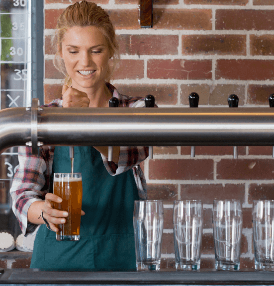 Woman pouring beer